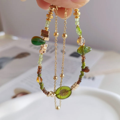 Pulsera de cuentas de dos capas Golden Forest con piedra preciosa de peridoto 