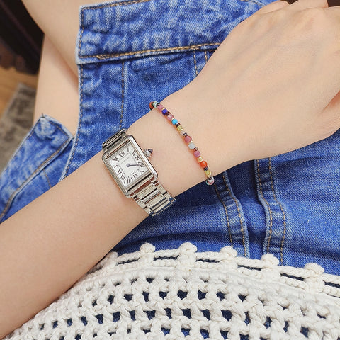 Colorful Kaleidoscope Mixed Bead Bracelet with Gold Detailing and Gemstone Medley