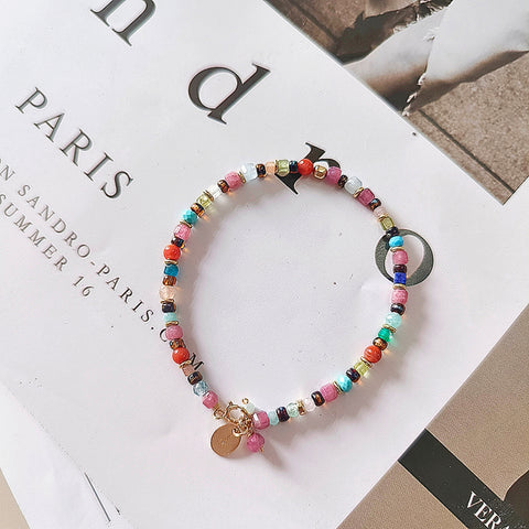 Pulsera colorida con cuentas mixtas de caleidoscopio, detalles dorados y mezcla de piedras preciosas 